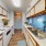 a kitchen with a sink and a couch