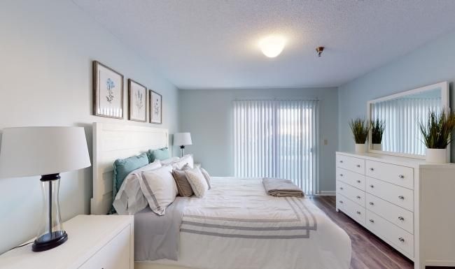 Bedroom options to fit every lifestyle a bedroom with a bed and lamps