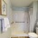 a bathroom with a shower and toilet